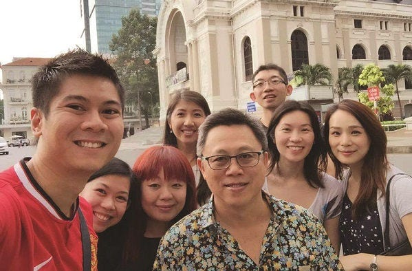 KPMG Partner Ho Wah Lee with colleagues outside of work