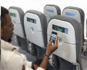 in-flight technology on back of passenger seats
