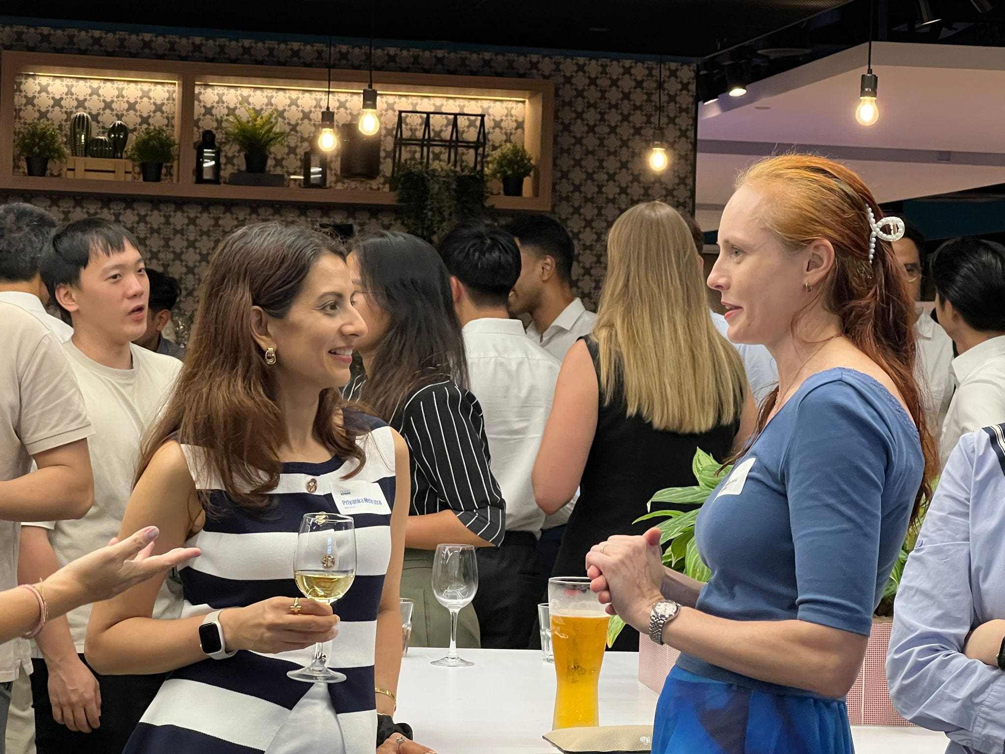 Chatting at the Deal Advisory Alumni Event 2025