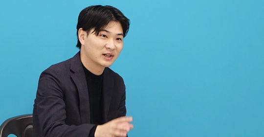 Japanese alt text: KPMG　小山