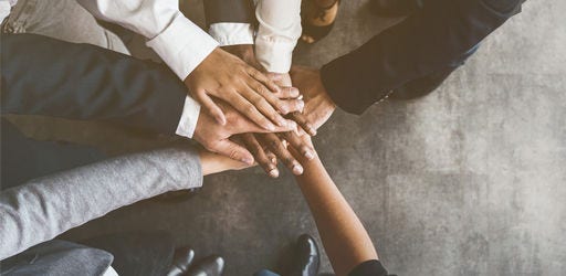 hands in meeting