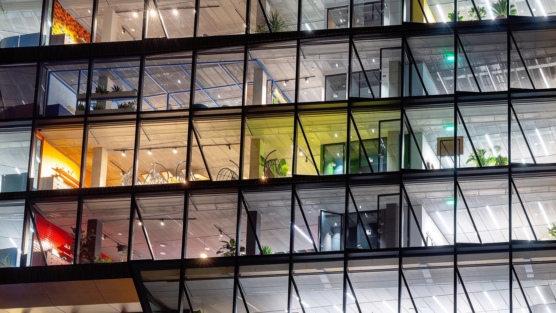 The office building’s floor-to-ceiling windows