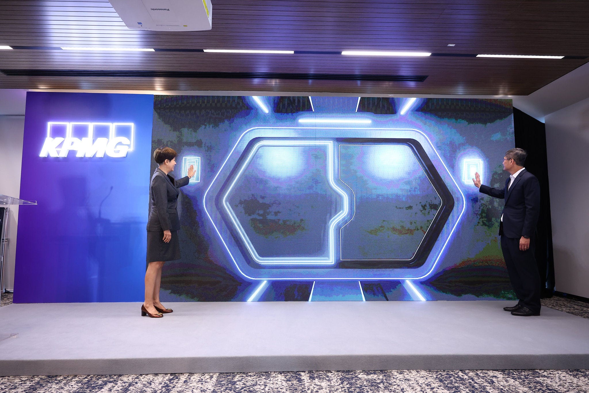 Guest of honour Minister Indranee Rajah and Managing Partner Ong Pang Thye at the official opening of KPMG in Singapore's office at Asia Square