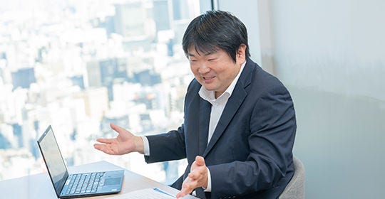 Japanese alt text: 対談写真_総務省 三木氏