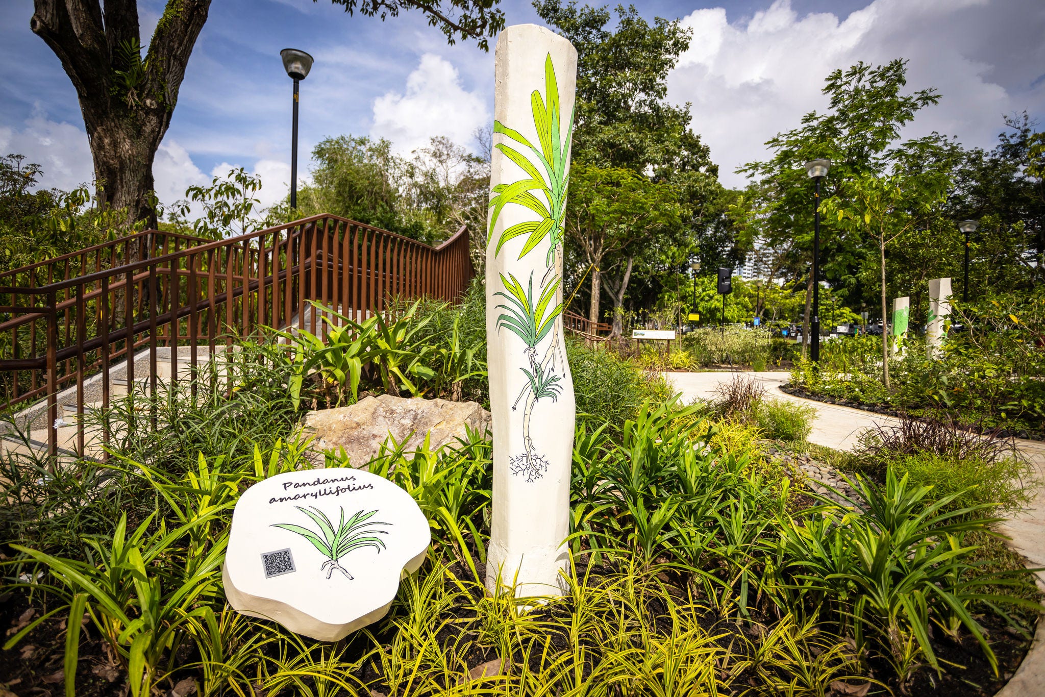 KPMG Wellness Garden tree cookie and totem pole