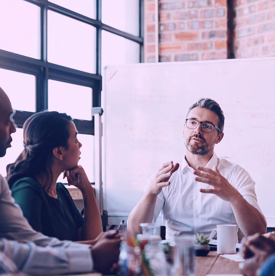 Man explaining in meeting