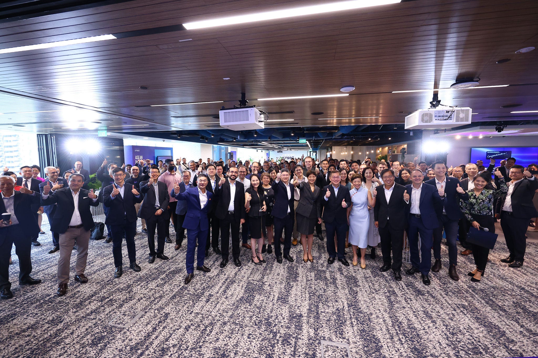 Group shot of guests at the official opening of KPMG in Singapore's office at Asia Square