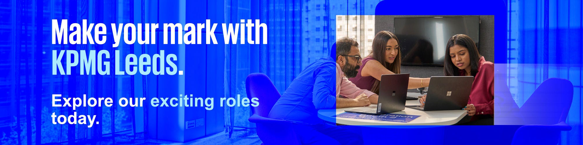 Three people sat around a table with 'Make your mark with KPMG Leeds' wording overlay
