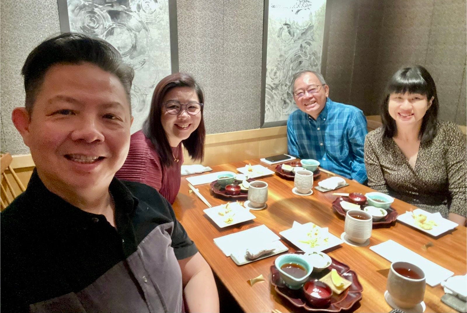 Retired KPMG Partner Richard Tan catching up with friends and former colleagues from KPMG
