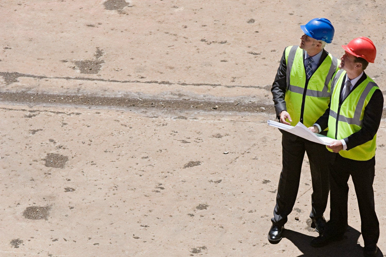 two business people in construction gear