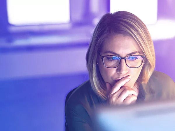 Woman looking at computer screen