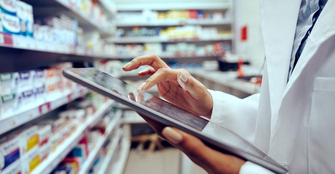 Pharmacist using tablet