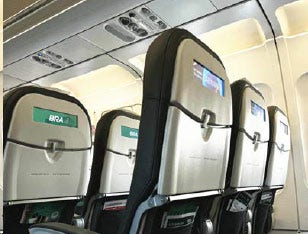Man using in-flight technology