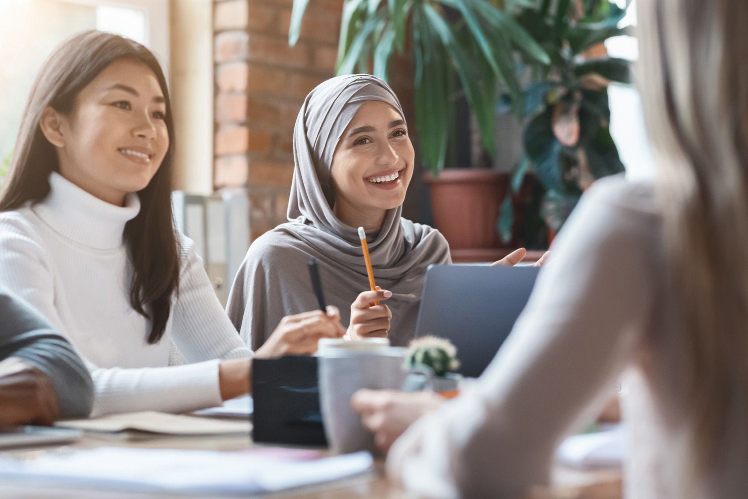 Three women in business meeting
