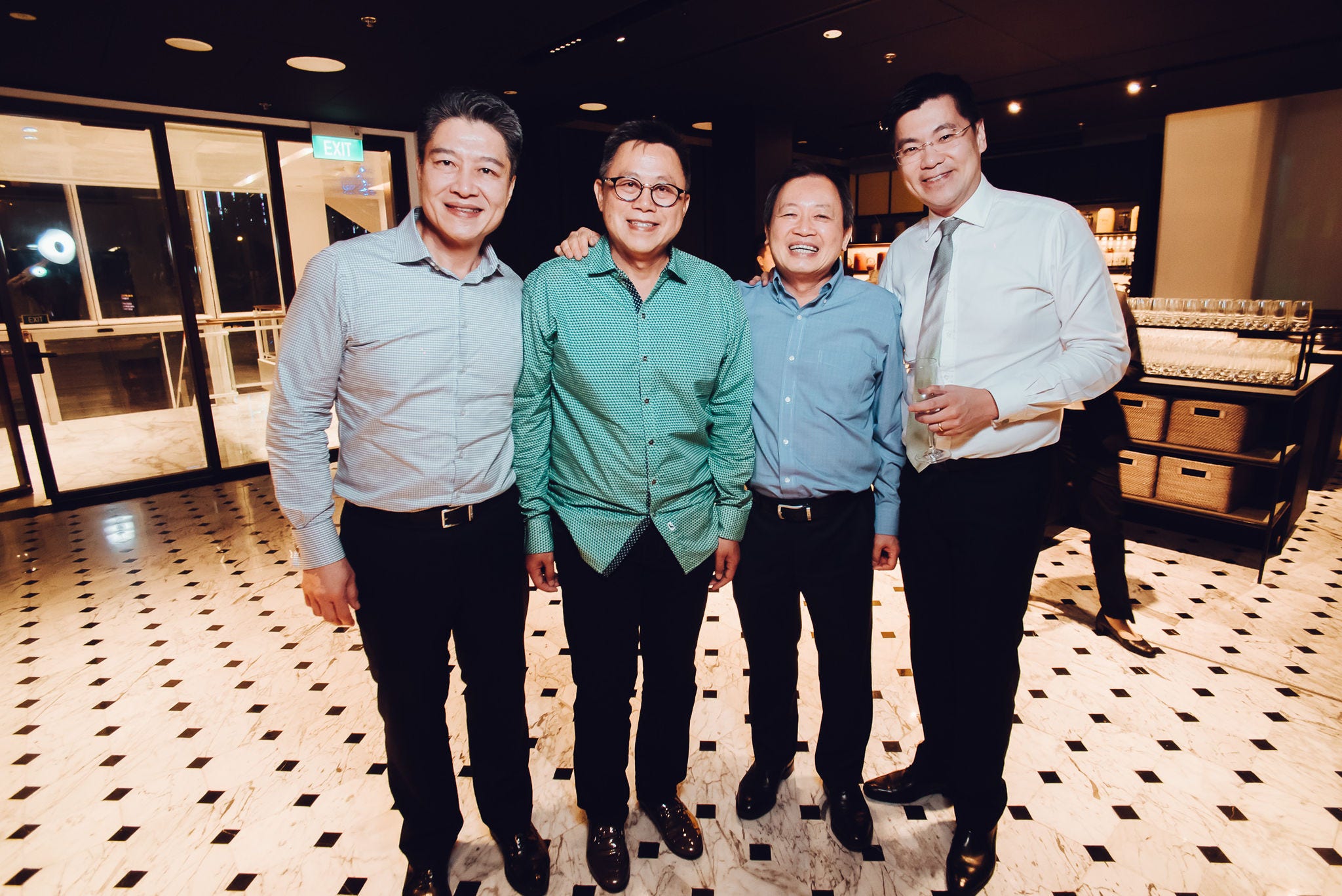 Ho Wah Lee catching up with past colleagues at KPMG alumni events