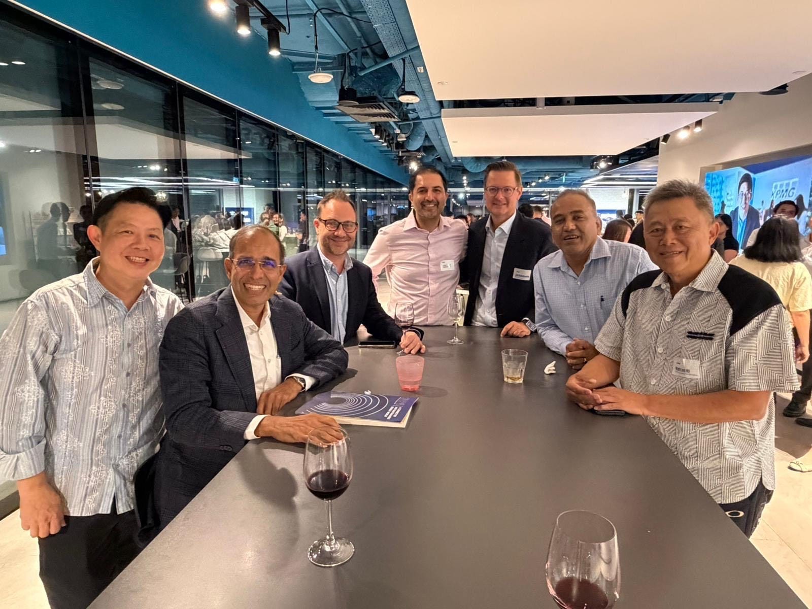 Ho Wah Lee catching up with past colleagues at KPMG alumni events