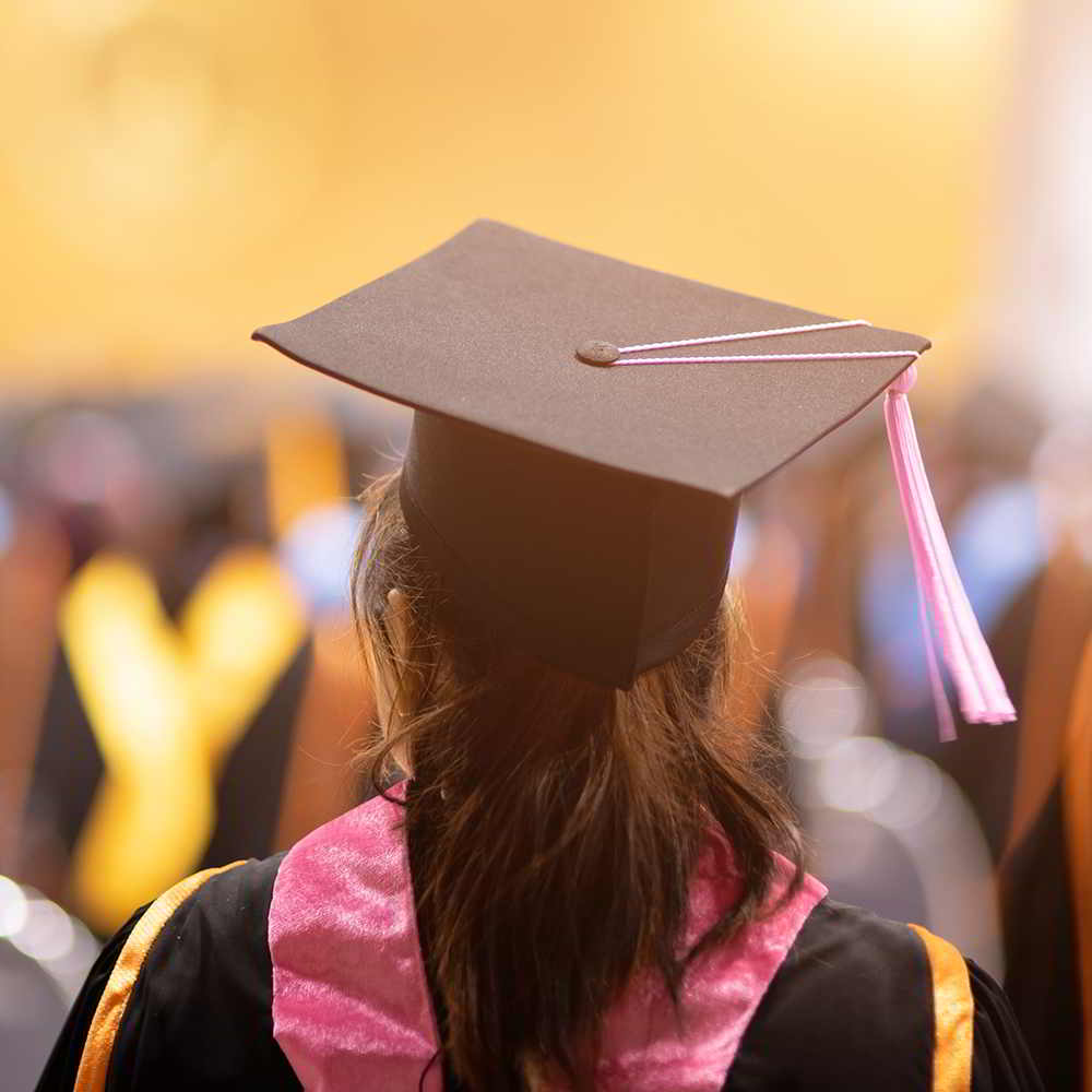 Graduate wearing mortar board