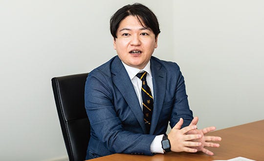 Japanese alt text: 日本貨物航空株式会社　経理部　決算管理チーム　アシスタントマネジャー　岡本 圭介 氏