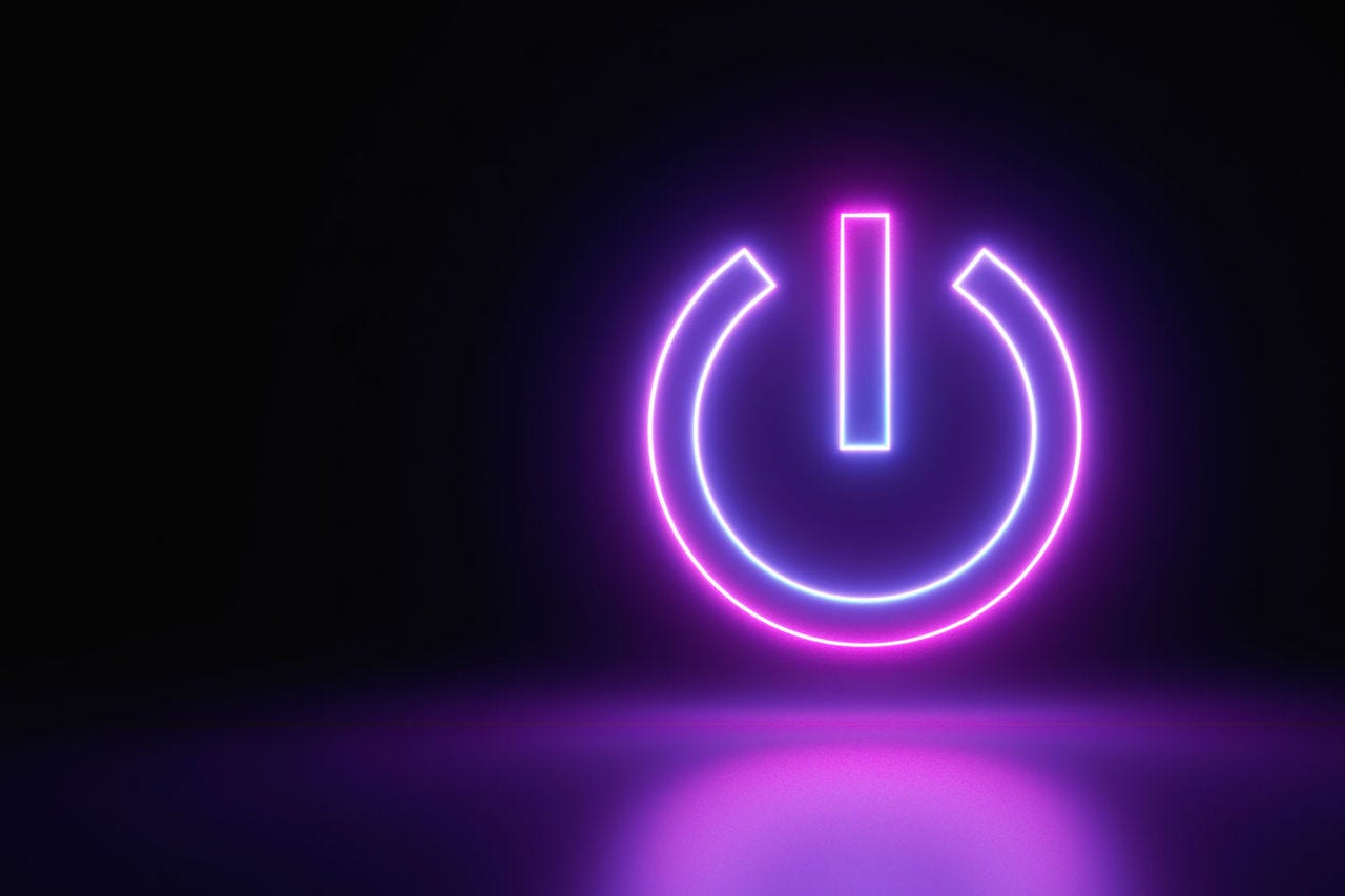Ignition Calgary purple neon power button on black