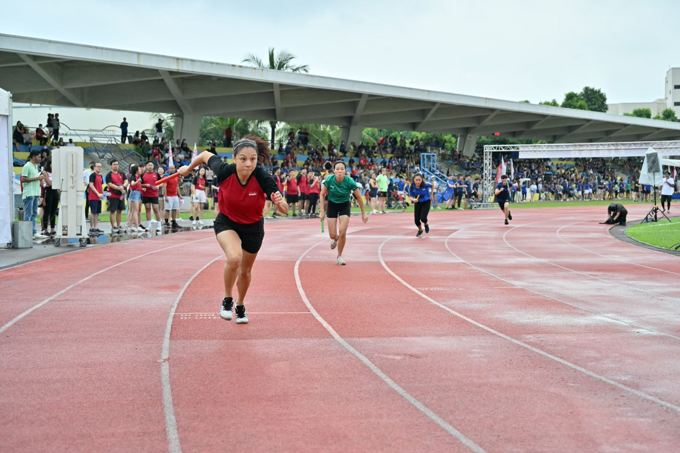 KPMG Day 2022 sprint relay race segment at Yio Chu Kang Stadium