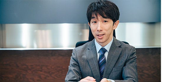Japanese alt text: 志賀国際特許事務所　及川氏
