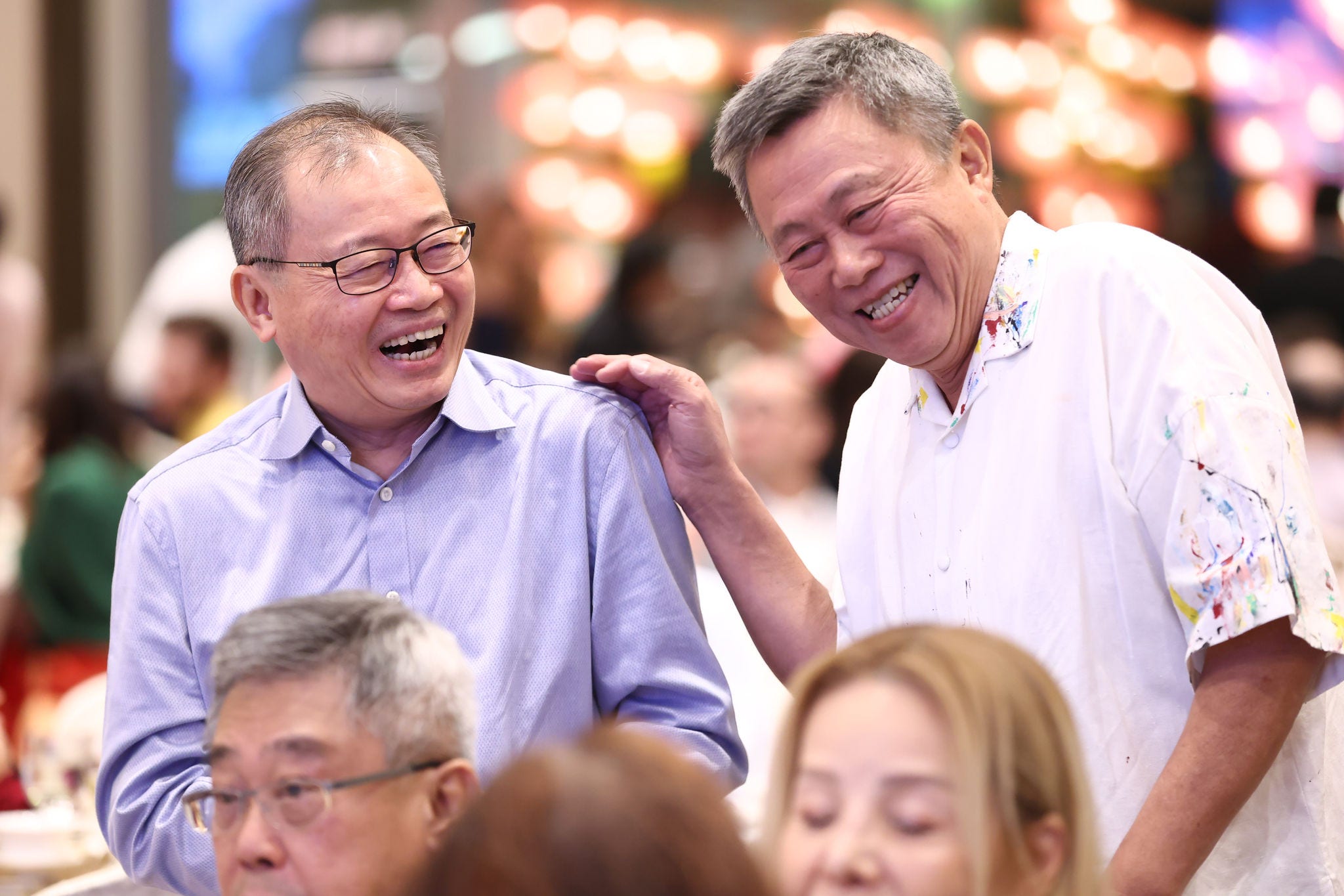 Ho Wah Lee catching up with past colleagues at KPMG alumni events