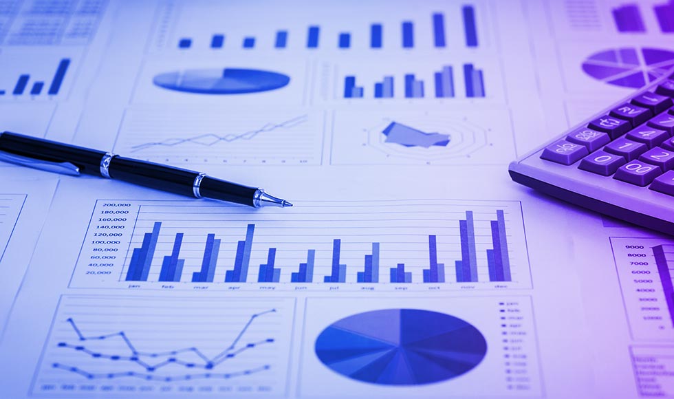 desk with financial charts