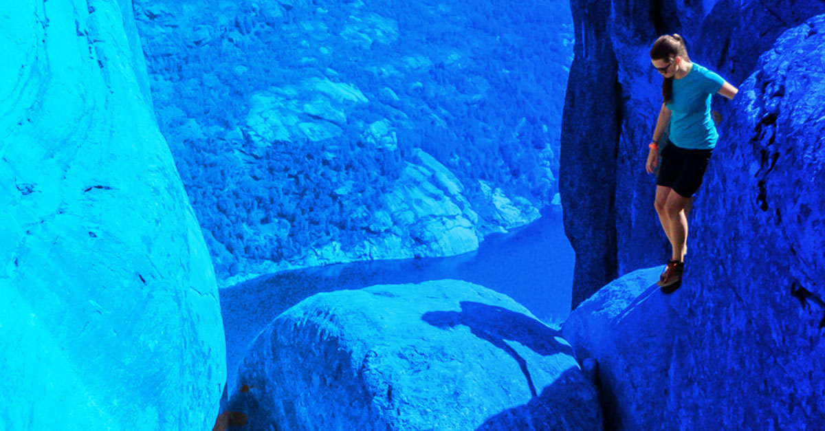 A girl climbing rocks